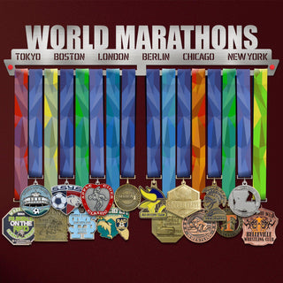 World Marathons Majors Medal Hanger Display Rack V1 showcasing medals from Tokyo, Boston, London, Berlin, Chicago, and New York marathons.